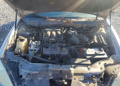 2005 Ford Taurus Se z USA, uszkodzony, nr VIN 1FAFP53U85A214940